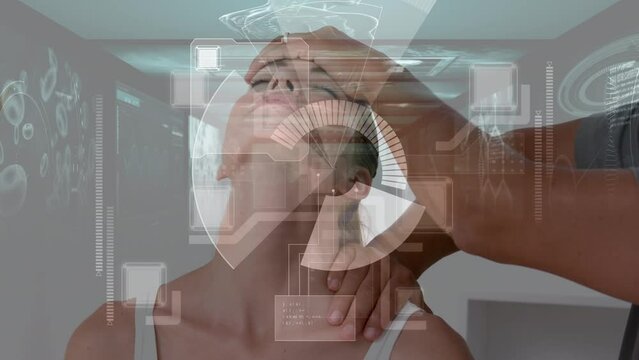 Animation of medical data processing over caucasian woman getting a massage from male physio