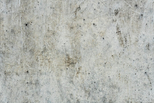 Statt-Stadt-Zeichen: Strukturen in einer Betonmauer als Zeitzeugen. Menschen; Regen; Sonne; Umwelteinflüsse; Hitze; Frost, Wind Schmutz, Farbe hinterlassen temporäre faszinierenden, plakativen Spuren.
