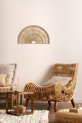 Sunny and bright space of living room with rattan armchair, chaise lounge, pillows, carpet,...