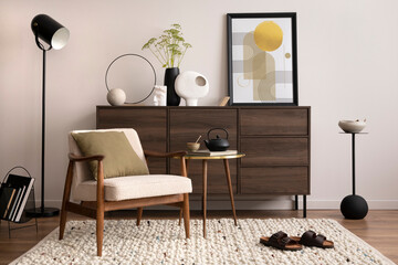Interior design of harmonized living room with brown commode, design boucle armchair, coffee table,...