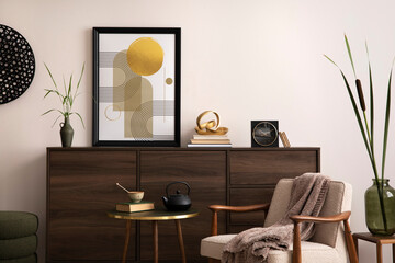 Interior design of harmonized living room with brown commode, design boucle armchair, coffee table, decoration, mock up poster frame and elegant personal accessories. Modern home decor. Template.