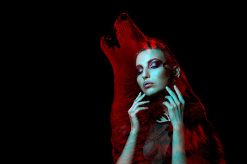 Gothic girl and wolf double exposure on black background. Werewolf concept. space for text