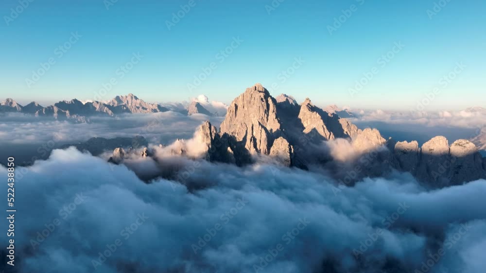 Wall mural View from above, stunning aerial view of the Cadini di Misurina during a beautiful sunrise. Cadini di Misurina is a group of mountains located in the Dolomites, Italy