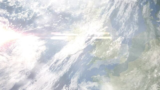 Earth zoom in from outer space to city. Zooming on Carlow, Ireland. The animation continues by zoom out through clouds and atmosphere into space. Images from NASA