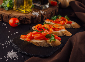 Bruschettas on cutting board close up