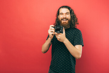 Fototapeta premium A portrait of a photographer smiling at the camera