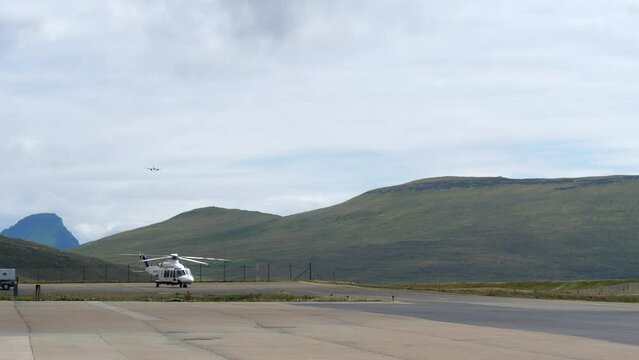 Passenger Airplane in Final Approach for Vagar Airport, Faroe Islands.