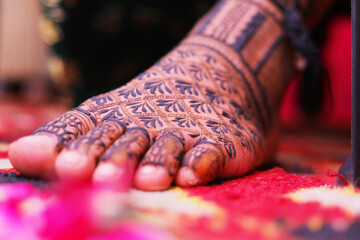 henna tattoo mehandi on foot.