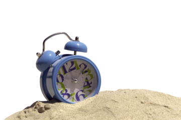 clock on sand at ten o'clock .summer time