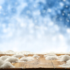 Wooden desk of free space and blurred window 