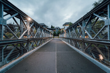 Steel bridge at dusk in the city