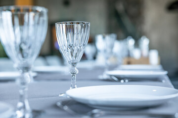 Empty glasses set in restaurant. Part of interior