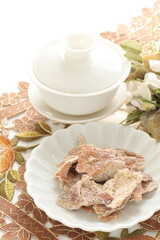 Chinese food, dried mandarin peel and tea for snack food image