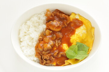 Beef stew and scrambled egg on rice with copy space