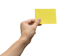 Hand holding yellow paper isolated on white with clipping path.