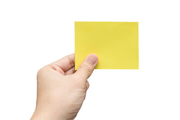 Hand holding yellow paper isolated on white with clipping path.