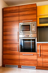 Modern kitchen unit with built-in appliances