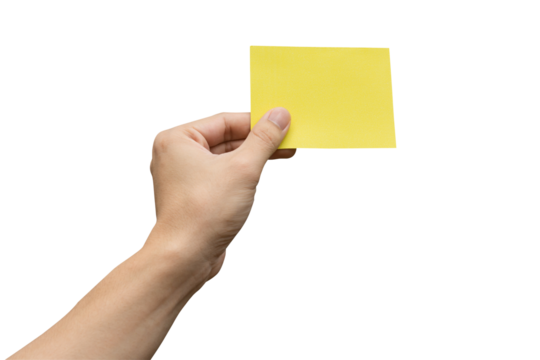 Hand holding yellow paper isolated on white with clipping path.