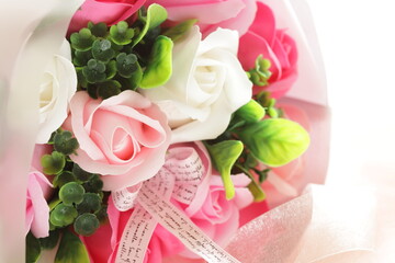 Artificial flower, soap made rose bouquet with copy space 