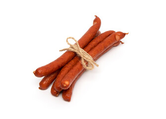 Smoked grilled thin Pork Sausages, close-up, isolated on white background
