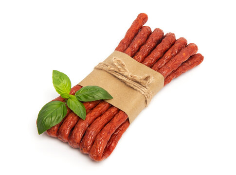 Thin Dry Smoked Pork or beef meat Polish Kabanos sausages Isolated on white background