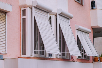 Aluminum folding blinds on the outside of the window. Protection from the sun and from burglary of the apartment