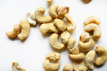 Cashew nuts on a white background close-up.