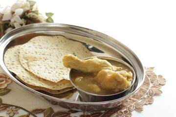 Chicken curry and pancake with copy space