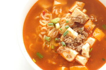 Fusion food, Chinese mapo tofu and ramen noodles in white bowl