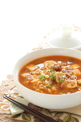 Fusion food, Chinese mapo tofu and ramen noodles in white bowl