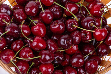 Background of ripe cherries in drops of water