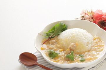 Chinese food, Chicken and sweet corn soup rice in white plate 