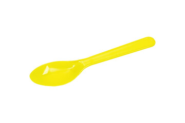Yellow plastic spoon isolated on white background.