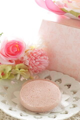 Pink color strawberry cookie on white dish for confectionery image