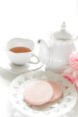 Pink color strawberry cookie and English tea