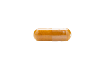 Turmeric Capsule isolated on white background with clipping path