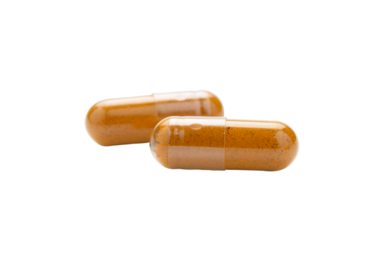 Turmeric Capsule isolated on white background with clipping path