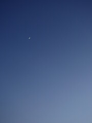 blue sky of twilight wit small moon