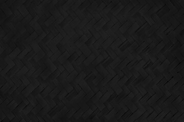Old black bamboo weave texture background, pattern of woven rattan mat in vintage style.