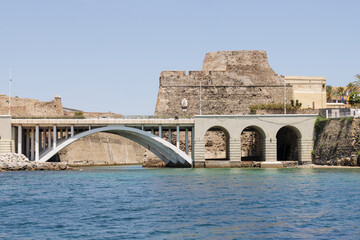 View from a tourist boat of the Royal Walls of Ceuta and its navigable moat