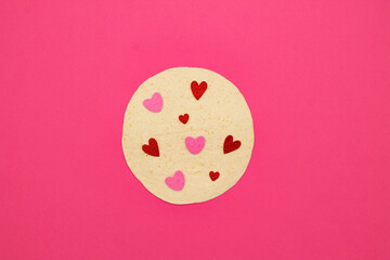 Red and rose hearts on tortilla. Street fast food and love concept. Pink background. Flat lay. Minimalism. 