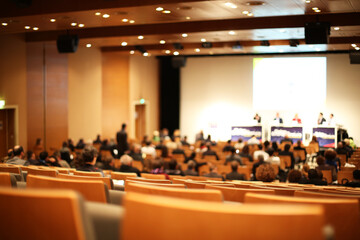 people in a conference room volontary blurred background concept