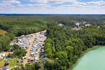 view of a campsite on the lake from Garbicz Festival, Poland