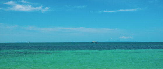 Panoramic view of tropical blue calm sea and clear sky in Thailand.