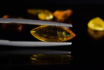 Yellow sapphire with luster for jewelry making.