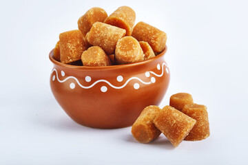 Organic Gur or Jaggery Powder and cubes, Jaggery is used as an ingredient in sweet and savoury dishes in the cuisines of India.