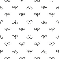 Seamless pattern with black doodle bows