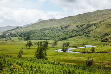 Landscape with river, grass and mountains, Scotland