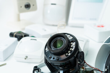 Mending of video cameras cctv. A disassembled surveillance camera on the desk
