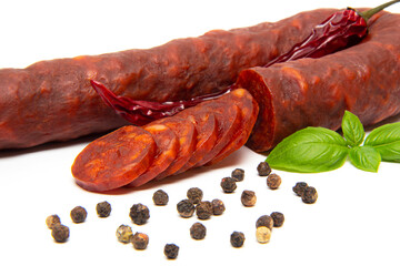 Spanish chorizo sausage on white background
